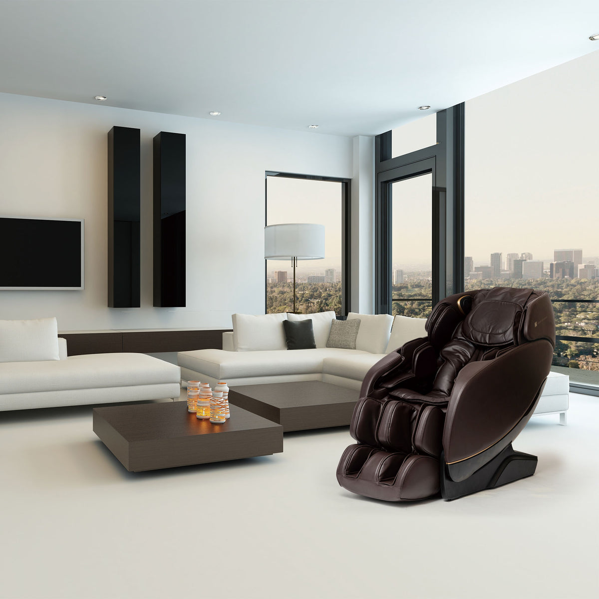 Brown leather Inner Balance Wellness Jin 2.0 Massage Chair with elegant gold trim, positioned in a sleek penthouse apartment
